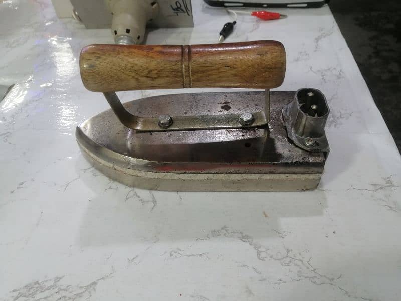 Electric iron and gas iron available 3