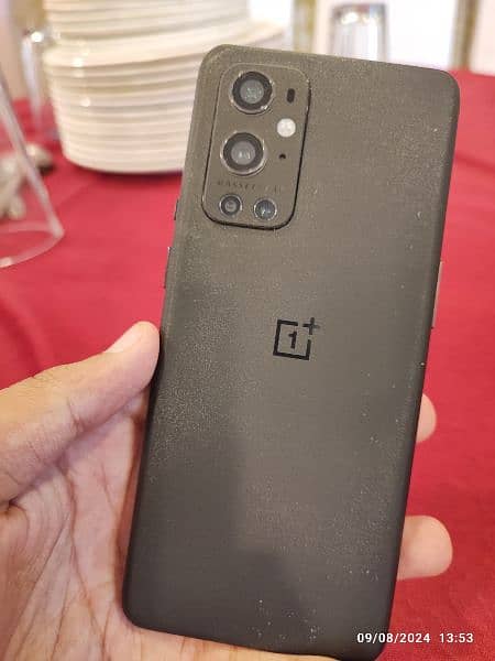 one plus 9 pro 12/256 with fast charger and back cover 1