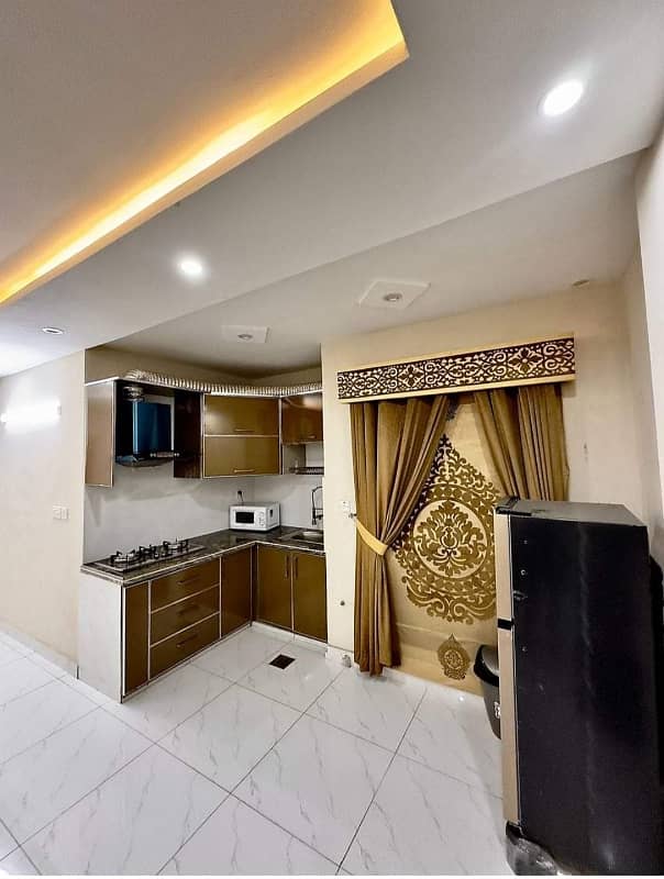 1 Bedroom VIP Full furnish flat per day available in Bahria town Lahore 8