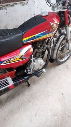 Honda 125 10/10 Lahore registration all doc complet with bio matric