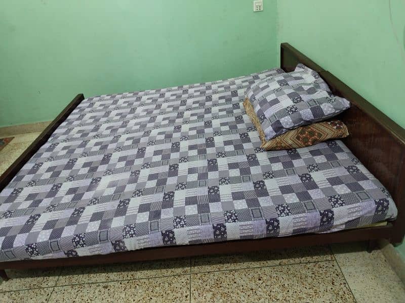 2 wooden single beds with hardboard & mattresses, all for 20,000. 1