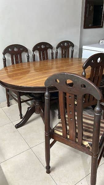 urgent sale wooden dining table good Condition with 6 Chairs 1