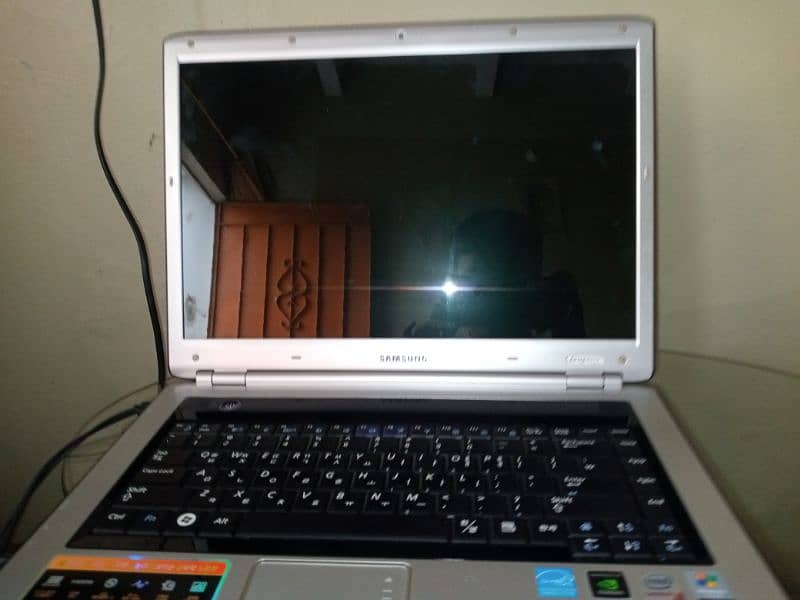 laptop ok hai windows7 hai new condition hai send r 510 model 1