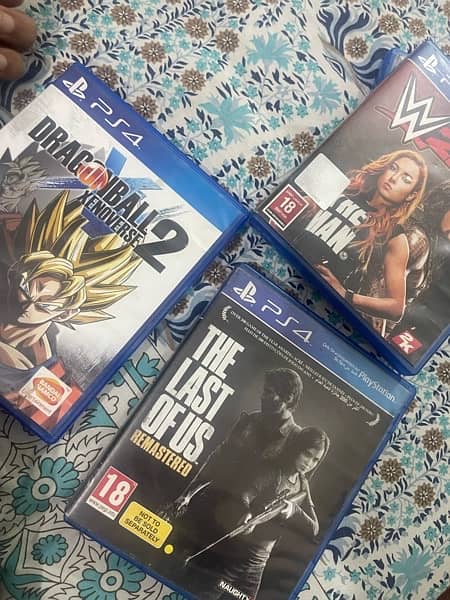 DARK SOULS , last of us remastered,dragon balls xenoeverse 2 , wwe2k20 2