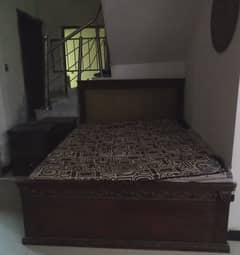 Brown bed set with matresses and side table