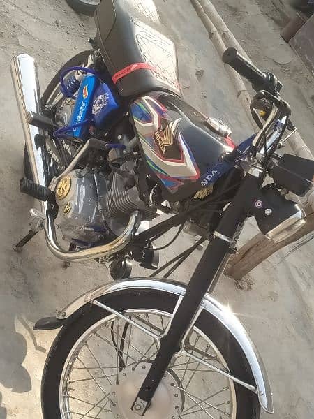 Honda 125 10/10 condition 1000km drive. 2