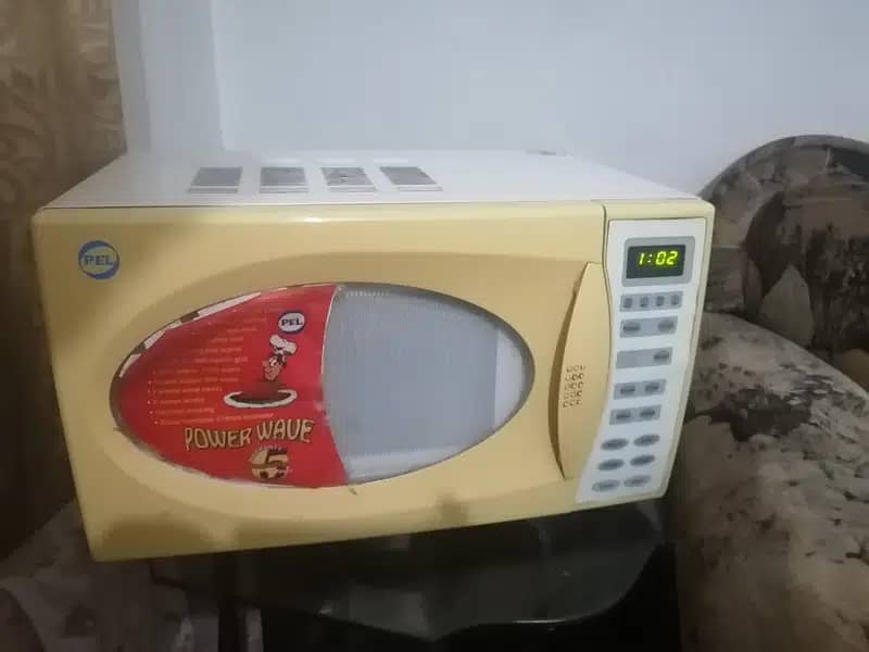 PEL microwave Oven (PMO23) for urgent sale in very reasonable price 0