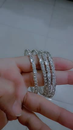 4 silver bangles for sale