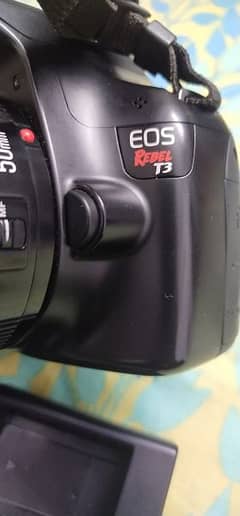 Canon Rebel T3 with 50mm lens 0