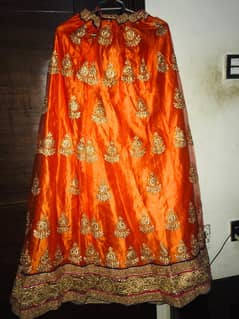 Orange lehnga for sale