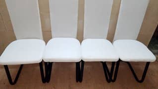 Set of _4_ Elegant White chairs.