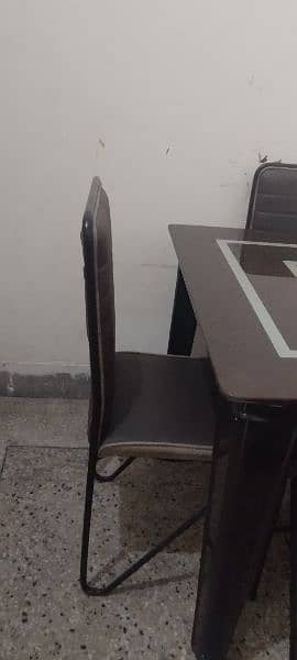 2 glass dinning tables with 8 chairs 6