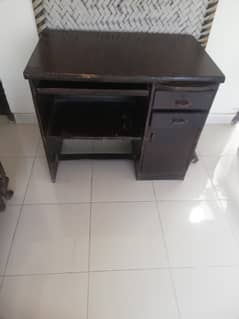 Computer table, dark brown color, one year old