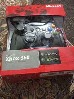 Xbox 360 with 2 controllerswith box 10/8 condition 0