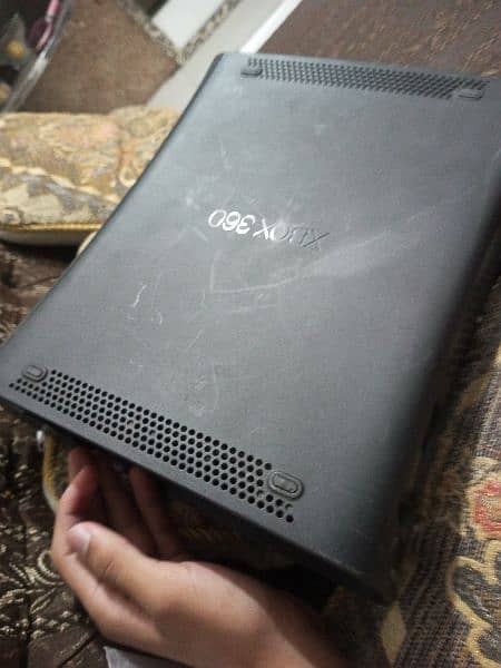 Xbox 360 with 2 controllerswith box 10/8 condition 7