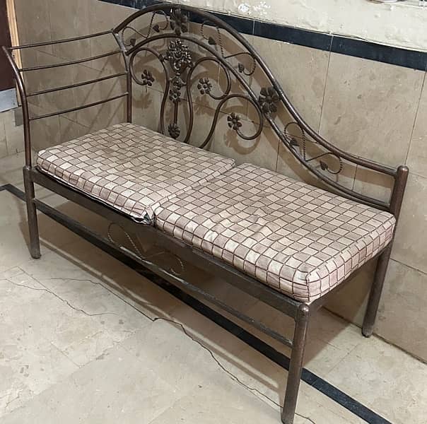 iron dewan with cushions. 1