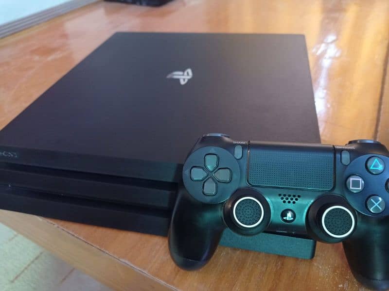 Playstation 4 Pro 4k with original box and FIFA 23 1