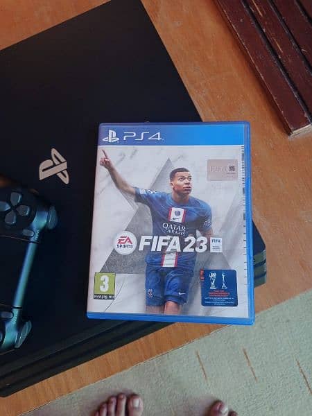 Playstation 4 Pro 4k with original box and FIFA 23 2