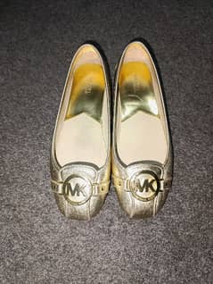 "MK pumps, almost brand new, only worn a few times.