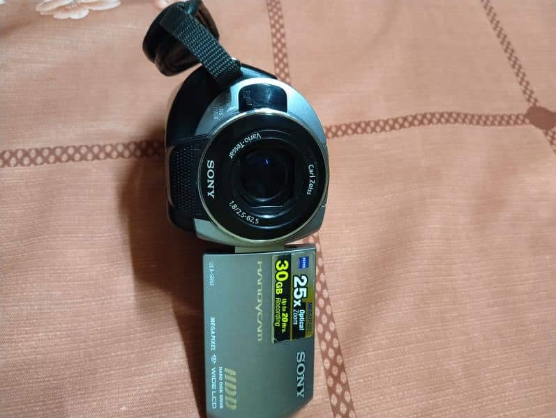 SONY HANDYCAM WITH A LOT OF FREE ASSESSORIES 8