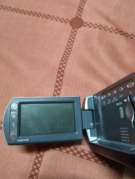 SONY HANDYCAM WITH A LOT OF FREE ASSESSORIES 10