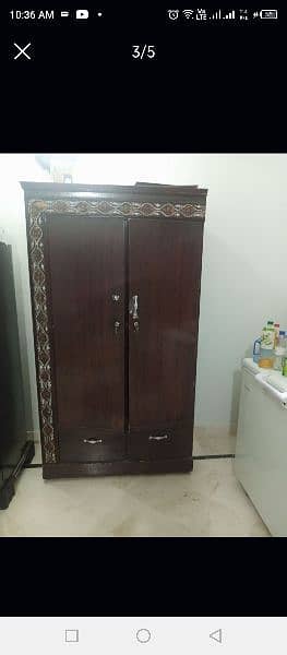 two door wooden cupboard with two draws 3