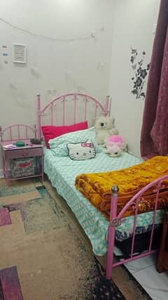 Girls bed with side table and dressing table