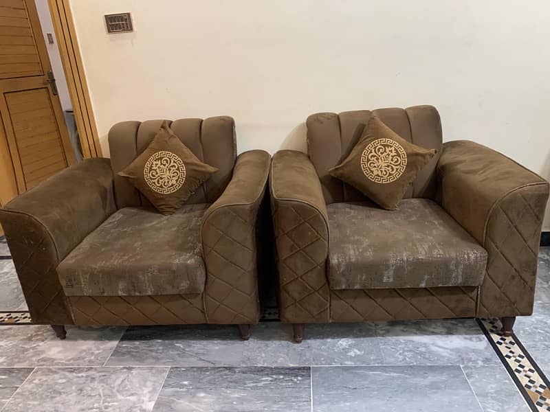 5 seater premium sofa set in brown colour a big square table 1