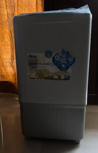 washing machine/ Haier Original 12 kg washing machine and dryer . 2