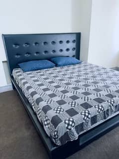 ALMOST NEW LEATHER AND WOODEN BED WITH BIG SIDE TABLE 2 0