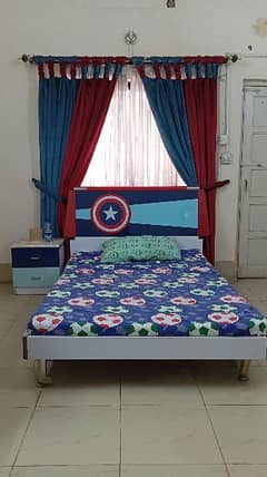 Captain America bed with inside drawers,mattress and side table.