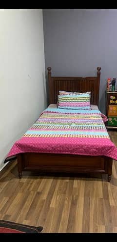 single beds in solid wood. . . . with mattress