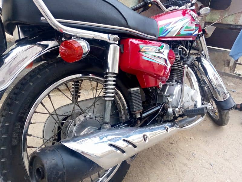 Altas Honda 125 2023 8 month ke ha Red calor 9