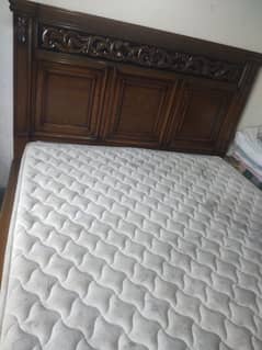 Bed and side table and mattress