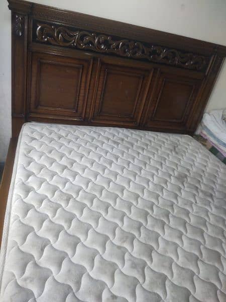 Bed and side table and mattress 0