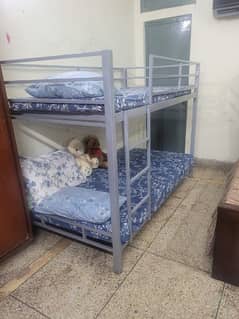 iron bunk bed almost new. . . .