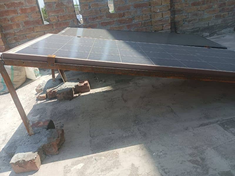 2 Solar plates, 2 stands, 1 inverter 7