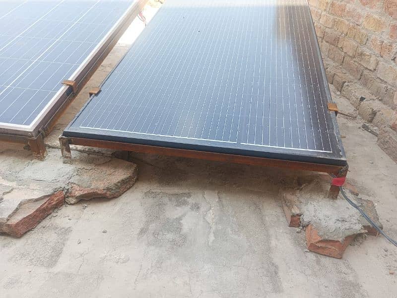 2 Solar plates, 2 stands, 1 inverter 8