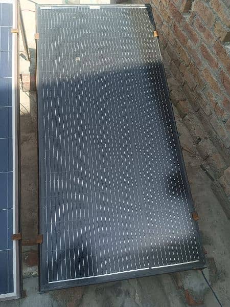 2 Solar plates, 2 stands, 1 inverter 10