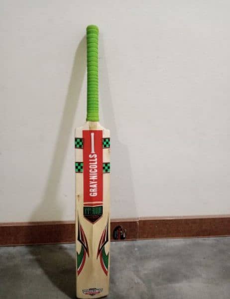 A Kashmiri hard ball bat is known for it balanced feel, light hard bat 0