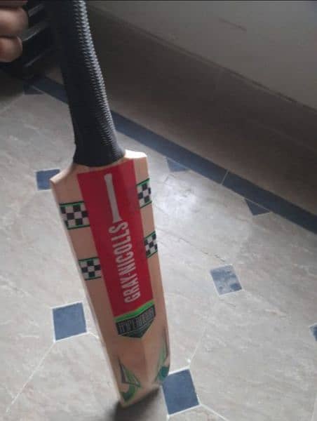 A Kashmiri hard ball bat is known for it balanced feel, light hard bat 3