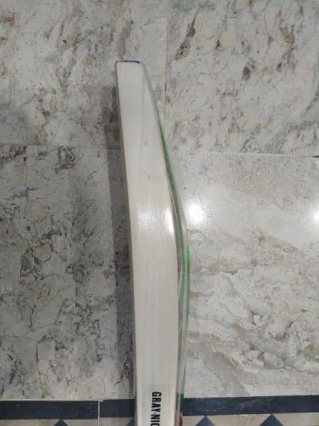 A Kashmiri hard ball bat is known for it balanced feel, light hard bat 4