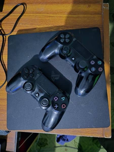 ps4 slim 1tb with 2 controllers and 3 games 2