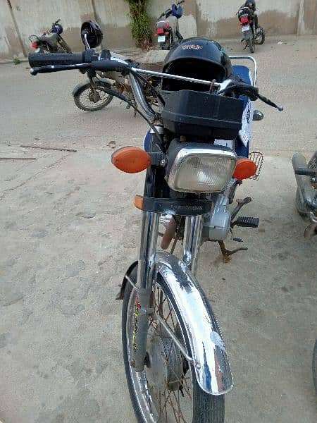 honda 125 registered karachi all ok 1