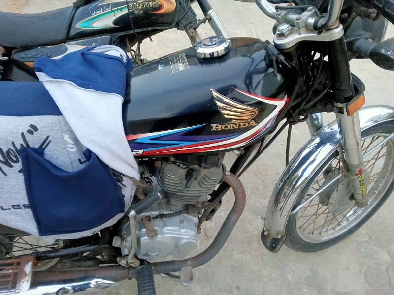 honda 125 registered karachi all ok 2