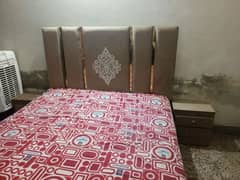 double bed with side tables with spring mattress