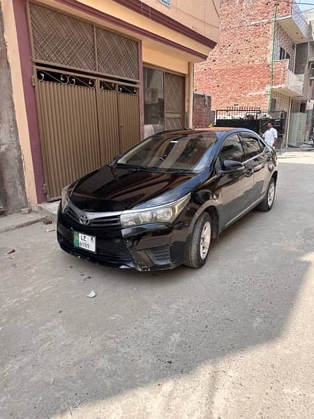 Toyota Corolla XLI 2014 covert gli chat phir bonat diggi original 11