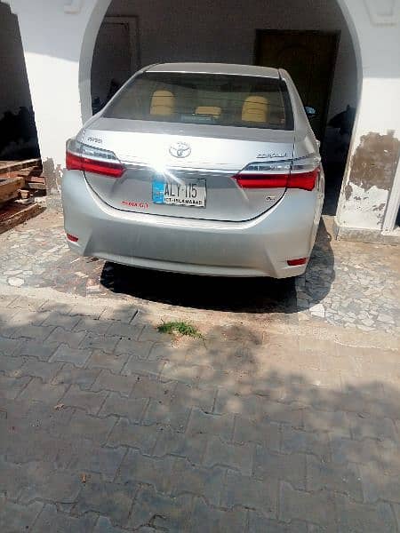 Toyota Corolla GLI 2019 model silver color Islamabad number 0