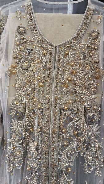 net gown organza dupatta with jamawar trouser with inner raw silk 1