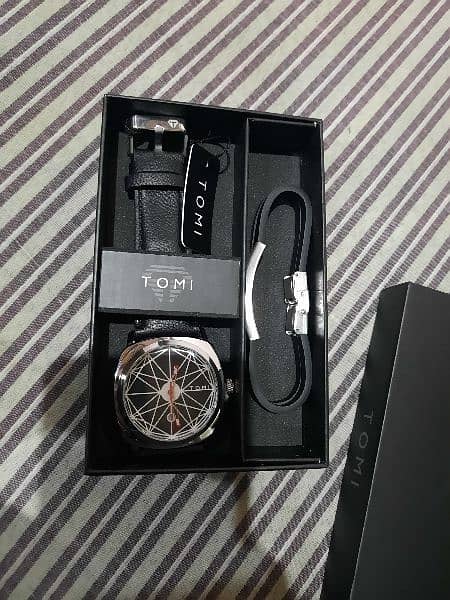 tomi watch Available 1